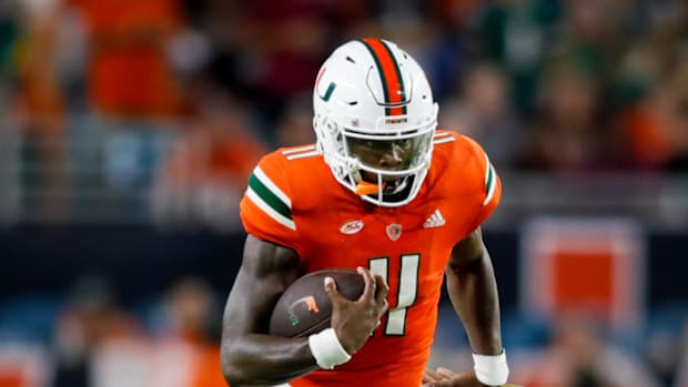 Miami Hurricanes quarterback Jacurri Brown (11)